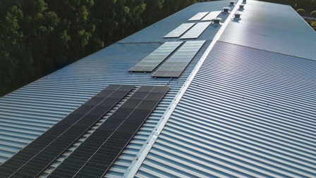 Photo of a steel roof with photovoltaic systems